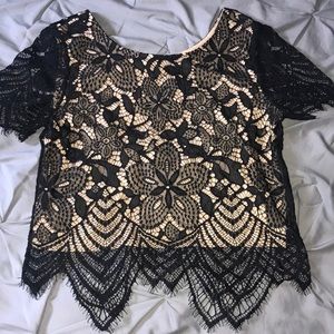 Black and nude lace crop top